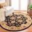 Handmade Black and Gold Oval Wool Area Rug