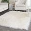 Ivory Tufted Faux Sheepskin 5' x 7' Rectangular Rug