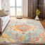 9' x 12' Orange and Teal Floral Synthetic Rug