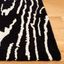 Ebony Hand-Tufted Black and Ivory Wool Rug, 3' x 5'