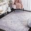 Beige and Grey 10' x 14' Washable Synthetic Rug