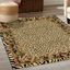 Ivory and Black 6' x 9' Synthetic Floral Safari Rug