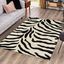 Ivory and Black Zebra Print Rectangular Synthetic Area Rug