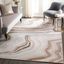 Gray and Ivory Abstract Synthetic 9' x 12' Area Rug