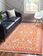 Terracotta and Ivory Abstract Synthetic Indoor Area Rug