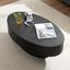 Black Oval Wood Drum Coffee Table with Grooved Design