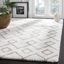 Ivory and Silver 6' x 9' Hand-Tufted Shag Rug