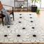 Ivory and Black Handmade Wool and Viscose Floral Rug