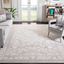 Beige and Cream Floral 10' x 14' Synthetic Area Rug