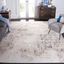 Ivory and Gray Abstract 10' x 14' Stain-Resistant Synthetic Rug