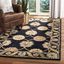 Handmade Black Wool and Cotton Tufted Area Rug