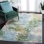 Dreamy Blue Floral 9' x 12' Easy Care Synthetic Area Rug