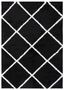 Black and White Geometric Shag 9' x 12' Synthetic Area Rug