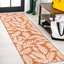 5' x 27' Orange and Cream Synthetic Flat Woven Reversible Rug