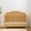 Honey Pine 4-in-1 Convertible Crib with Arched Headboard