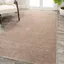 Beige Solid Synthetic Low-Pile Reversible Area Rug