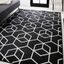 Mid-Century Geometric Black and White Synthetic Area Rug