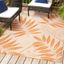 Tropical Palm Leaf Cream/Orange 5x8 Indoor/Outdoor Easy-Care Rug