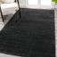 Black Solid Low-Pile Synthetic Indoor Area Rug 3x5