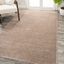 Beige Solid Low-Pile Synthetic Indoor Area Rug