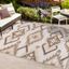 Ivory and Brown Geometric Synthetic 4' x 6' Indoor/Outdoor Rug