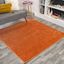 Haze Solid Orange 7' Square Synthetic Area Rug