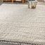 Cream 8' x 10' Reversible Shag Area Rug with Tassels