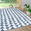 Ivory and Blue Geometric 4' x 6' Synthetic Area Rug