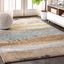 Blue and Beige Abstract Synthetic Area Rug