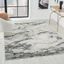 Ivory 5' x 7' Abstract Stain-Resistant Synthetic Area Rug